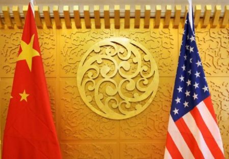 Chinese and U.S. flags are set up for a meeting during a visit by U.S. Secretary of Transportation Elaine Chao at China's Ministry of Transport in Beijing