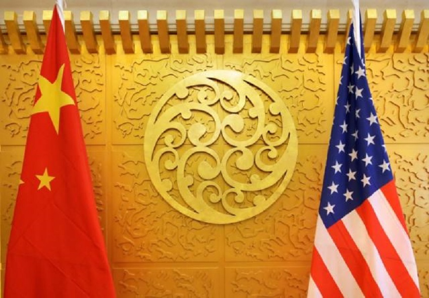 Chinese and U.S. flags are set up for a meeting during a visit by U.S. Secretary of Transportation Elaine Chao at China's Ministry of Transport in Beijing